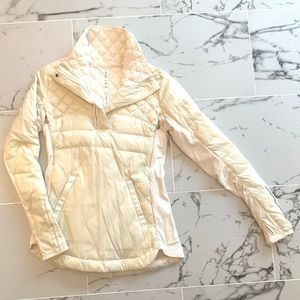 Never worn!! Cream Lululemon womens half zip jacket, size 6